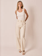 Jean évasé Greige FAUVE femme, GREIGE, taille XS, porté par Zoé (1m76) (FAM PARIS) – photo 1